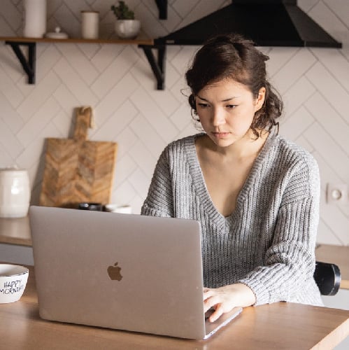 Woman working from home on laptop